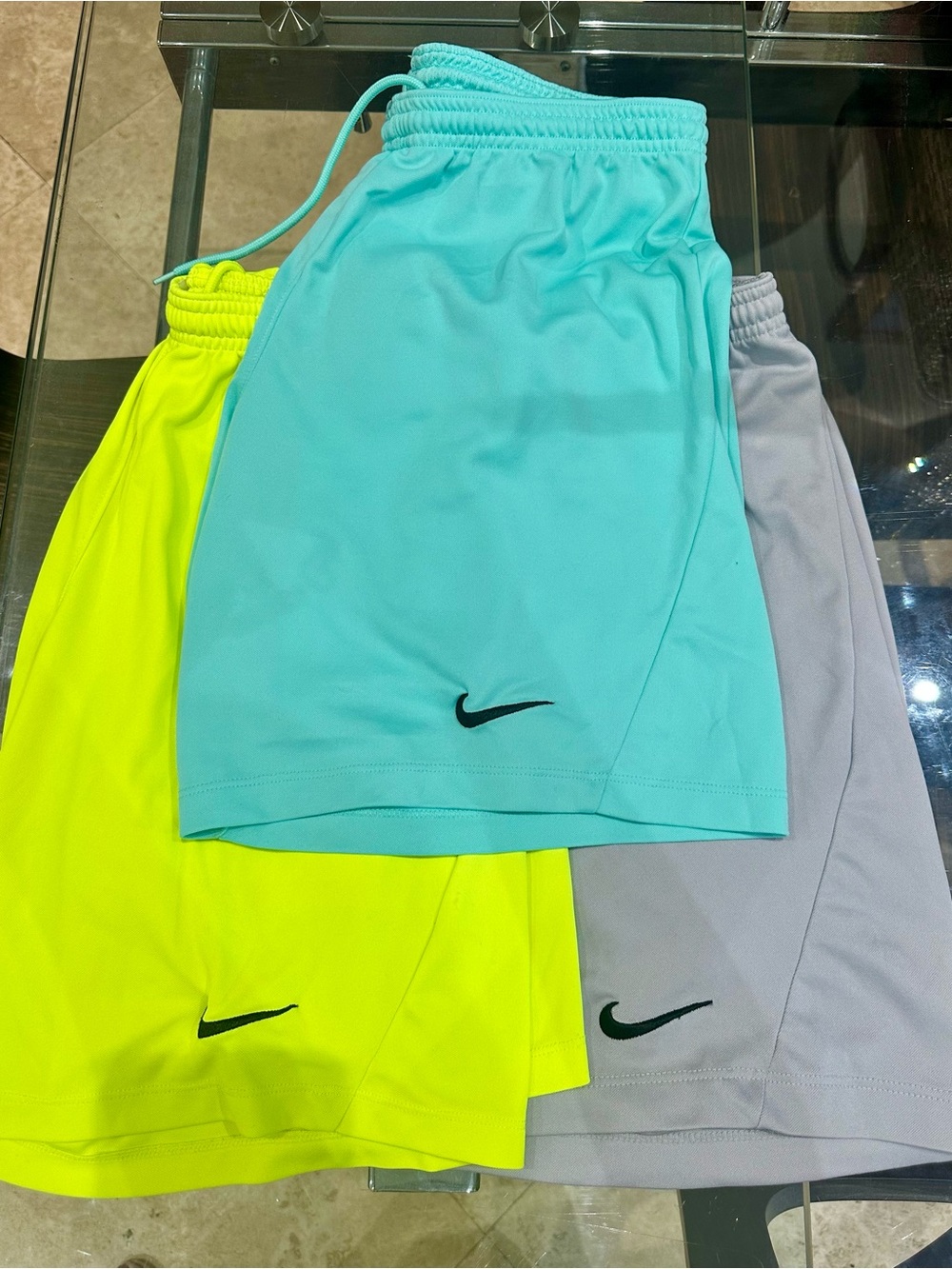 Three pairs of Nike dri fit shorts